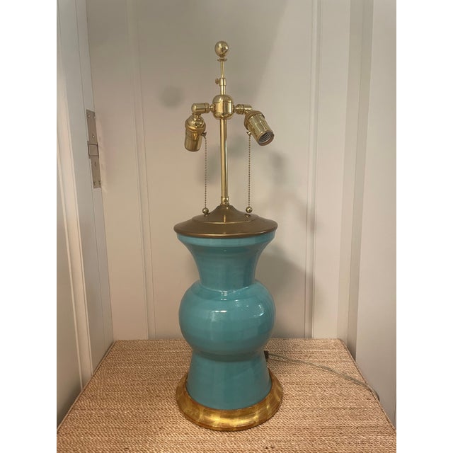 A striking example of Christopher Spitzmiller's signature ceramic craftsmanship, this table lamp features a beautifully...