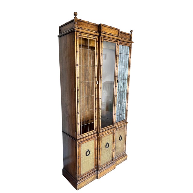Fantastic vintage Coastal China display cabinet. A beautiful lacquered finish on a chic bamboo trim design. Long glass...