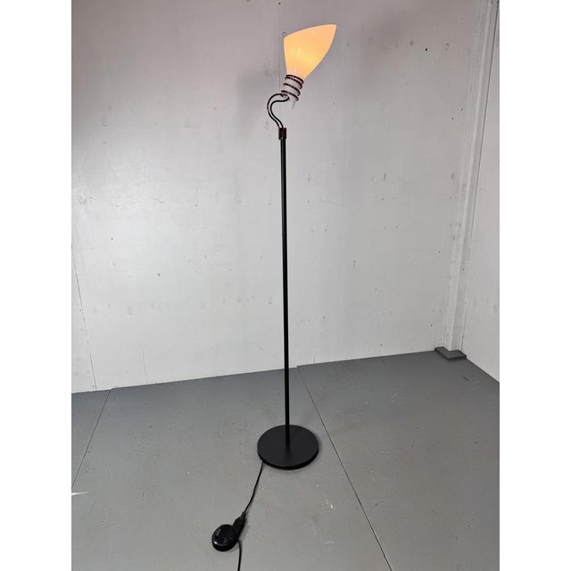 Italian Murano Vistosi Floor lamp Designed and made in the 1990s Vistosi Murano Glass held by a elegant brass tranch....