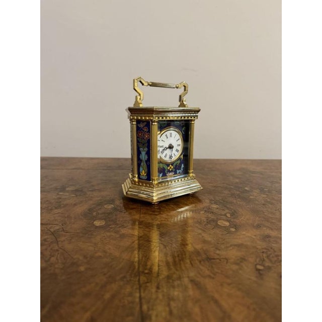 Superb quality antique French brass carriage clock with fantastic decorated panels, having a superb quality gilded brass...