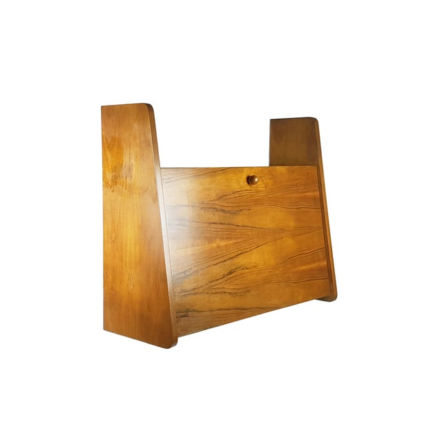 Wooden wall secretaire with drop-off top desk, made in the 1950s. The design and workmanship of this secretaire is very...