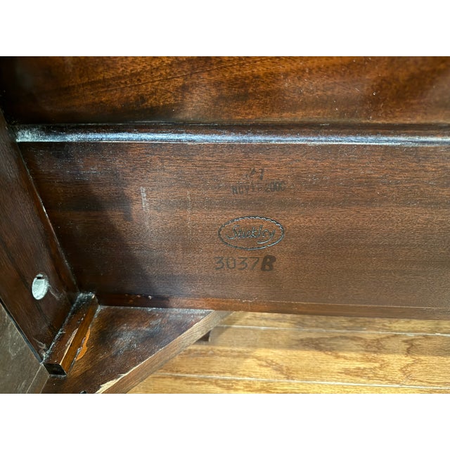 Offered is a striking heirloom-quality Queen Sleigh Bed (Model 3037B) manufactured by the legendary E.J. Audi / Stickley....