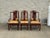 Likely rosewood or hongmu-style hardwood with a deep reddish brown finish and visible grain throughout. Includes two...