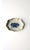 A blue and white (stone-white) jewelry dish with hand-painted floral and leaf design and scalloped edge, in the Rococo...