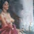 A contemplative woman sits smoking as her wine-colored robe falls loosely around her, while cigarette smoke drifts upwards...