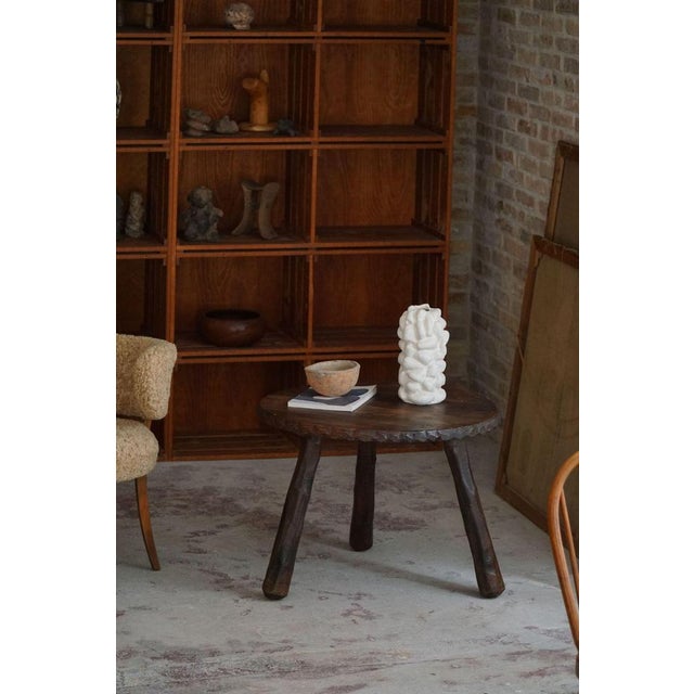 A Wabi Sabi side / coffee table, expertly carved from stained pine by a skilled Swedish cabinetmaker during the 1960s....