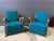 Pair of Vintage Art Deco lounge chairs with carved wood frames and original blue fabric cushions. Dimensions: H 33”x W...