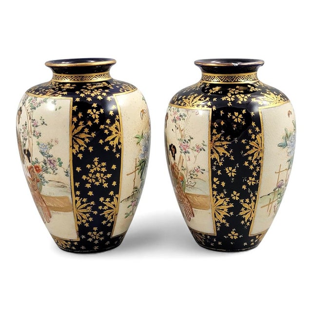 A sophisticated pair of Kyoto Satsuma vases from the Kinkozan workshop, made c.1890–1905. Deep cobalt shoulders and bases...