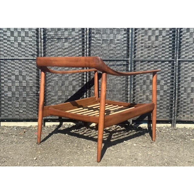 The frame is in original condition however the cushions were replaced to new ones. This piece is attributed to the...