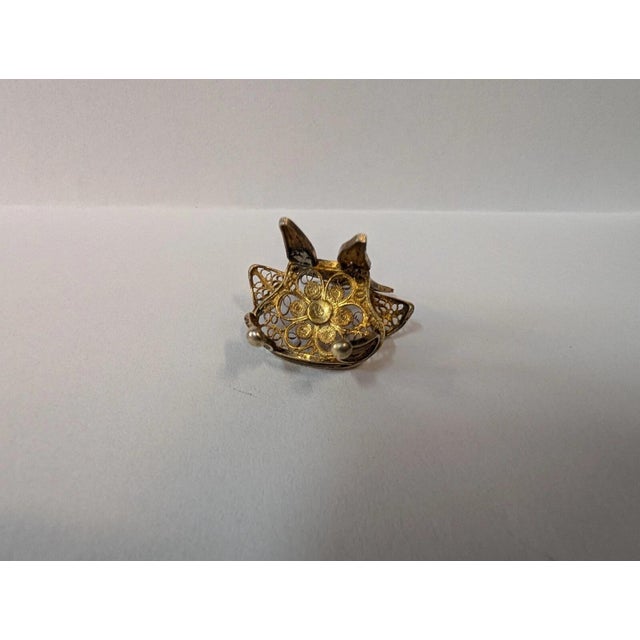 This vintage early twenteeth century hand crafted silver filergra furniture set is designed with a vermeil covering....