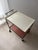 Color sets the rhythm of this original Pilastro serving trolley from the 1960s. Tjerk Reijenga combined a black metal...