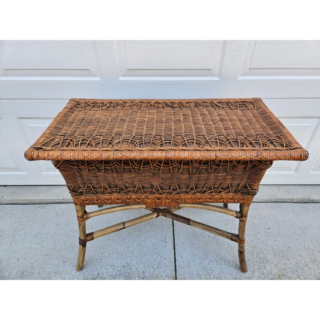 This piece could double as a rattan and bamboo console table or as a lidded planter box. It has plenty of charm. The...