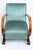 Art deco armchair, made in italy, 1930s. This art deco-style armchair features a wooden frame with semicircular armrests....