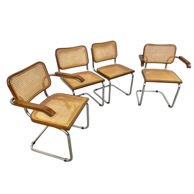 This listing is for a set of four Vintage Italian Modern Cesca Dining Chairs. Featuring two arm chairs, two side chairs,...
