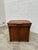 This old reception counter made of solid oak has been completely restored. Its front is decorated with crooks. It has a...