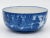 Decorative willow flow blue bowl. This design featured pagodas, trees, and birds. Flow blue is a style popular in Regency...