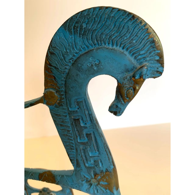 Proud head bowing chariot horse with the equally proud warrior. Made out of all brass, this piece is in excellent vintage...