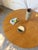 Small sunburst mirror in patinated gold metal, XS size. Beautifully undulating sunburst arms. Hanging attachment on the...
