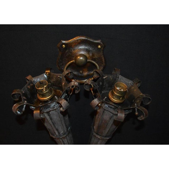 An exceptional large Victorian Gothic twin-light wall torchère dating to the mid-19th century, circa 1850s, combining...