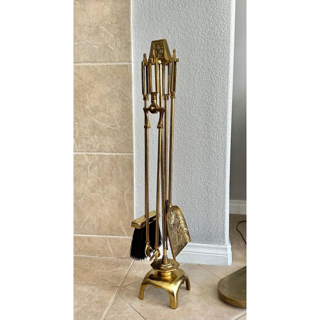Mid century James Mont style Asian inspired motif 5-piece fireplace tool set. Heavy high quality cast brass with intricate...