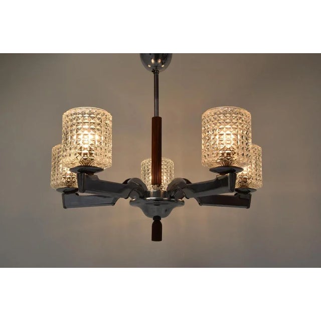 Made in Czechoslovakia Made of glass, chrome, plastic New cabling. With aged patina. 5x40W,E27 or E26 bulb. Re-polished...