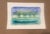 An original watercolor painting capturing the quiet beauty of a misty lakeside landscape. Soft washes of blue, aqua, and...