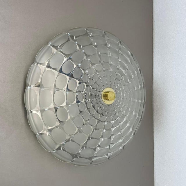 Article: Wall light sconce, also useable as ceiling light Origin: Germany Age: 1970s This original modernist light was...