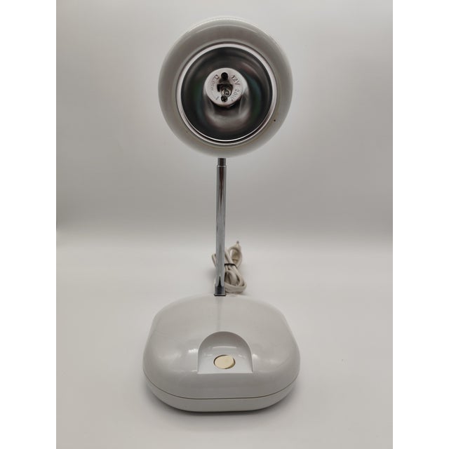 This vintage Space Age "Eye Ball" lamp was made in Germany in the 1970s. When the telescopic rod is extended, it measures...