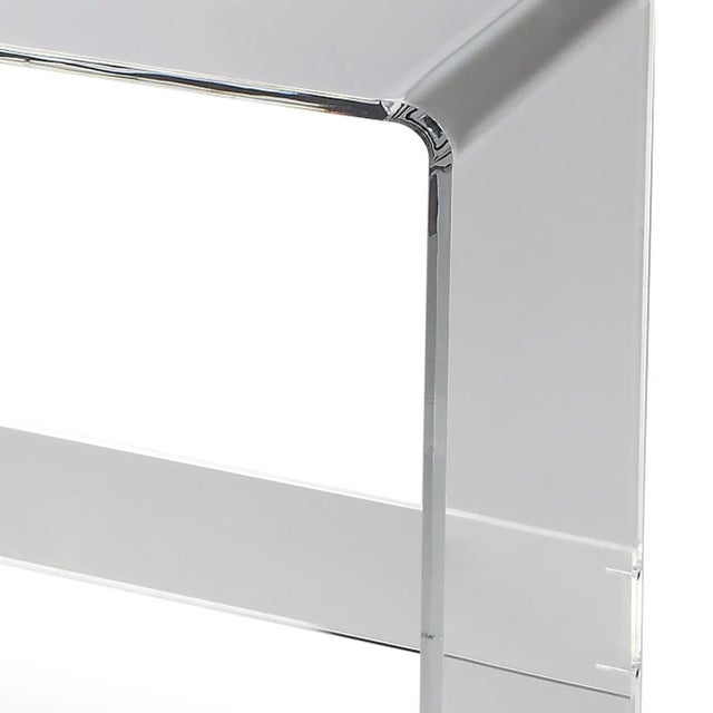 This clear acrylic console table is a stylish addition in any modern living room, hallway or entryway. Display framed...
