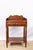 An antique mahogany washstand, late 19th century, American. Featuring a shaped wood gallery, single drawer with matching...