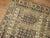 Throw size worn late 19th century Caucasian 3 x 5 rug in earthy palette. Rust, navy, Classic cluue, ivory. The wear is...