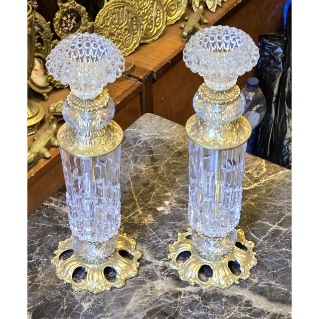 Designed for spaces that value detail and balance, this brass and crystal candlestick holder brings understated elegance...
