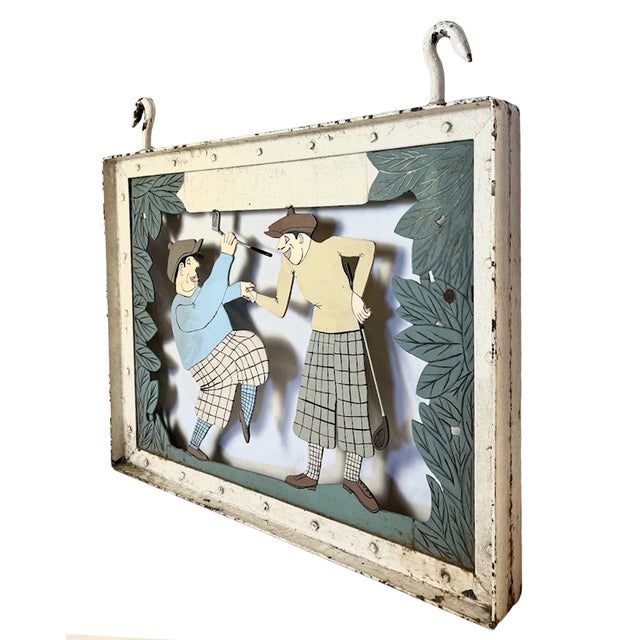 Rare, double sided heavy metal sign with two golfers in classic knickers. Wonderful folk art appeal in these...