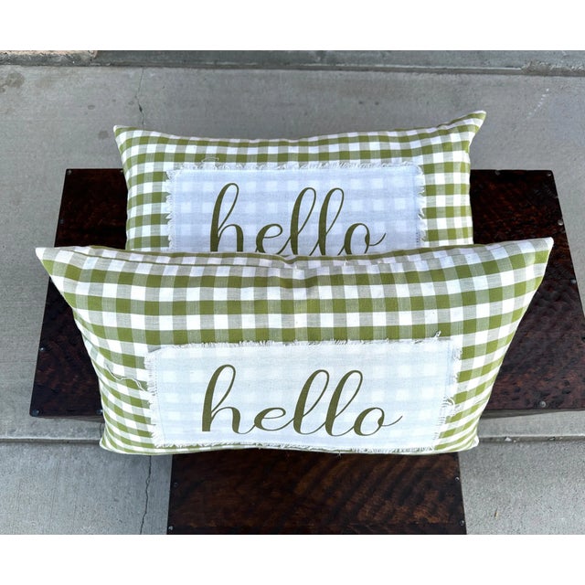 Super cute pair of Green Checked Decor Pillows with Hello saying. Perfect on a side chair or twin beds would also be...
