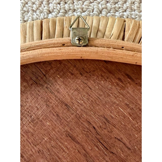 Gorgeous vintage rattan round mirror. Chic and simple make this perfect addition to any decor. Acquired from a palm Beach...