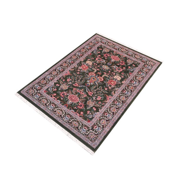 Designed with mesmerizing intricacy and gorgeous color palette, this hand-knotted masterpiece demonstrates the beauty and...