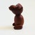 A mid century turned wood figurine in the shape of a monkey. Adorable stylized features. Made in Japan by Senshukai as...