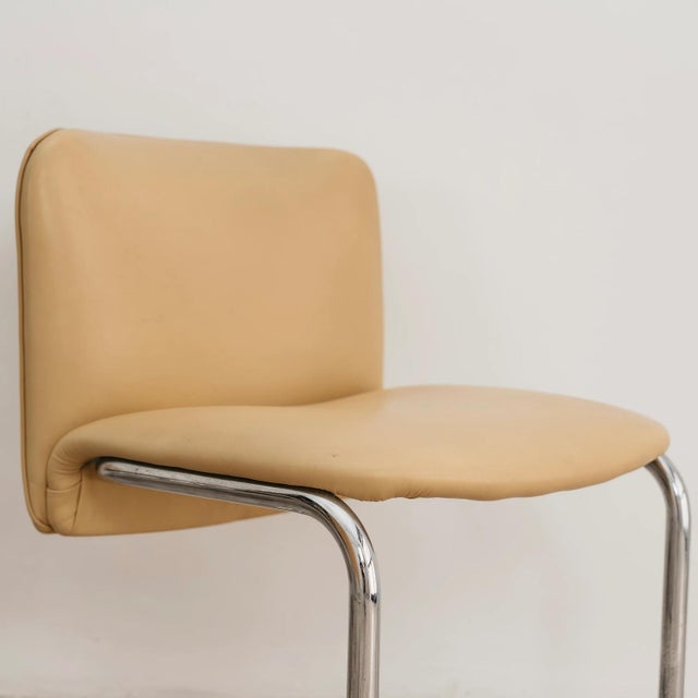 A splendid and refined set of six vintage chairs dating back to the 1970s, fully inspired by the modern style and clean...