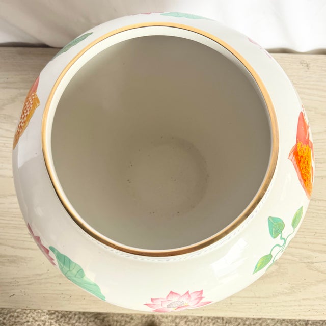 This 1987 porcelain vase titled “The Case of the Golden Carp” by Zhe Zhou Jiang is a refined example of late 20th-century...