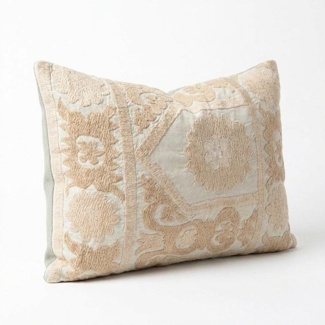 This beautiful 16'' x 22'' hand-embroidered Suzani pillow cover was made from authentic Uzbek cotton fabric. The intricate...