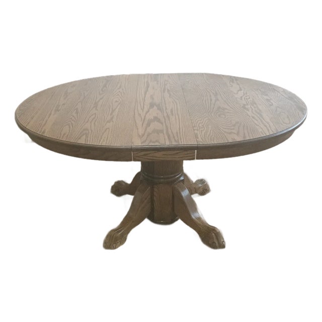 Antique Round Oak Pedestal Dining Table With Claw Feet Dating From the Late 19th to Early 20th Century. For Sale