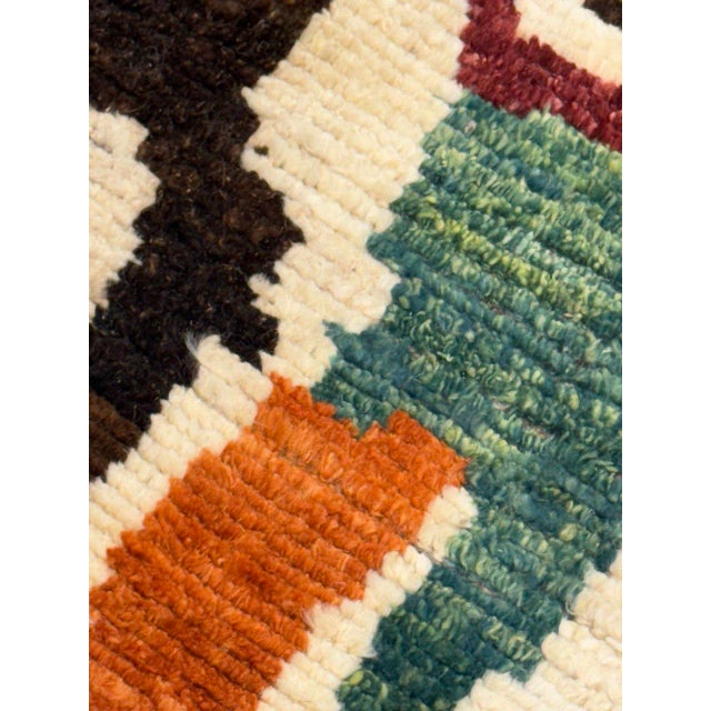 Elevate your decor with the exotic charm of Moroccan rugs. Hand Knotted to perfection, these rugs boast intricate designs...