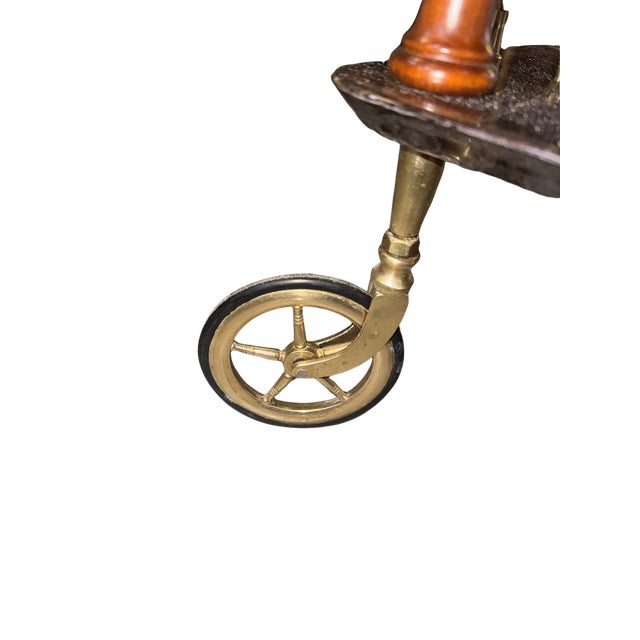 This refined Italian mid-century bar cart is attributed to Aldo Tura, showcasing two tiers adorned with richly patinated...