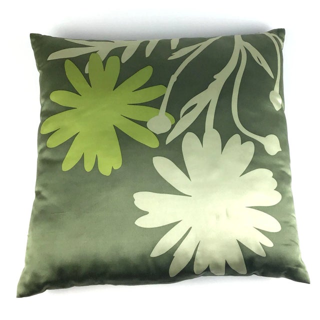 Add a blast of color to any drab room. We love the flower power and the colors. Zippered so easy to clean.