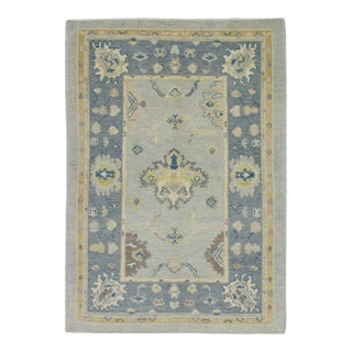 Early 21st Century Blue Floral Design Handwoven Wool Turkish Oushak Rug 4' X 6'1" For Sale