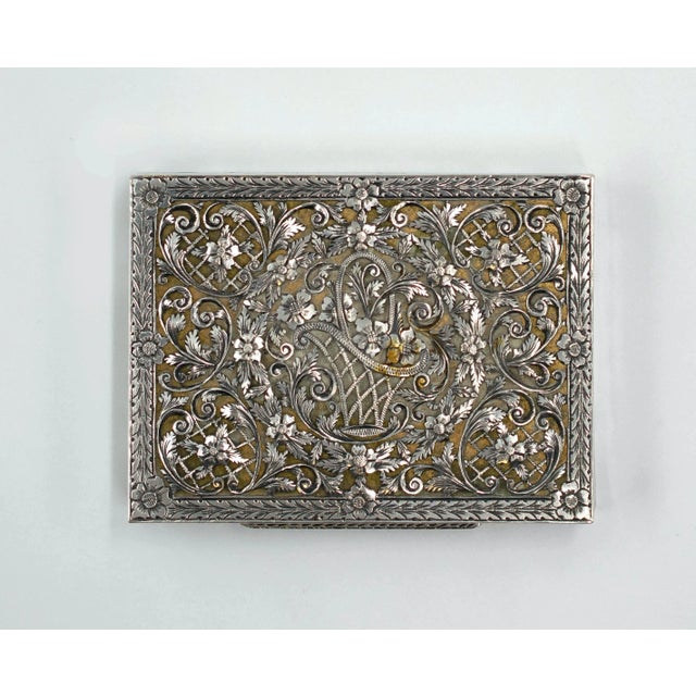 Silver powder case is a precious decorative object realized in 20th century. Very elegant powder case in silver with...