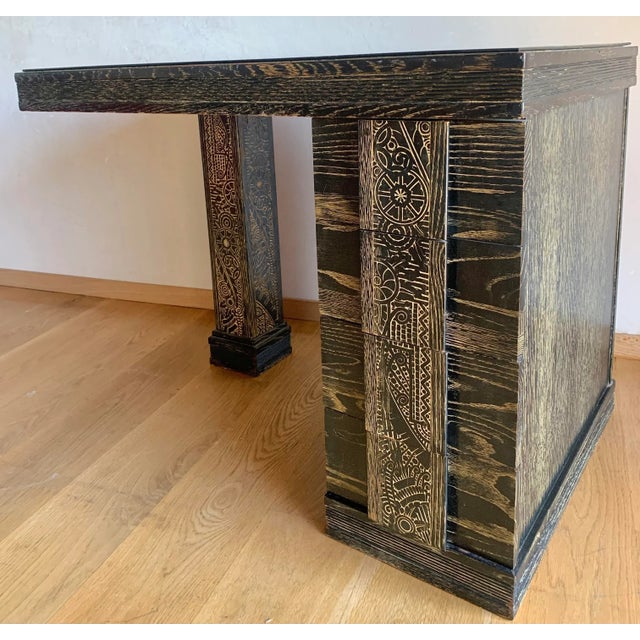 Stunning and scarce piece. This is a smaller-scale but spacious desk featuring a heavily carved pillar support and...
