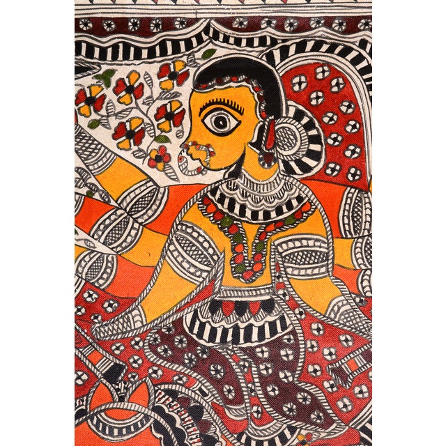 An expressive, hand-painted Madhubani folk painting by Mamta Devi, a recipient of the National Award in 2016, depicting...
