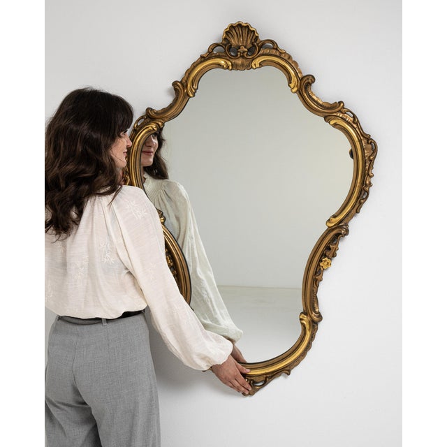 A mirror whose gold gilt ornate shaped frame gives it real character at first glance. Dating to 1900s and originating from...