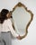 A mirror whose gold gilt ornate shaped frame gives it real character at first glance. Dating to 1900s and originating from...
